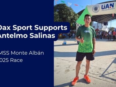 Antelmo Salinas stands confidently after a race, wearing a green Oax Sport shirt and orange running shoes, representing Oax Sport’s support ahead of the IMSS Monte Albán 2025 race in Oaxaca, Mexico.