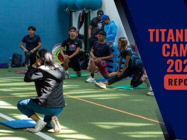 Banner for Titanes Camp 2025 Impact Report showing athletes doing mobility drills during an indoor training session, with TITANES CAMP 2025 and IMPACT REPORT text on a navy side panel.